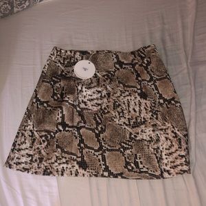 Verge girl snake skin skirt